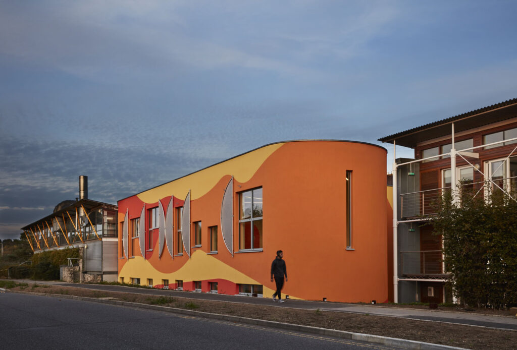 External view of the orange building that is Innovation Studio at Arts University Bournemouth