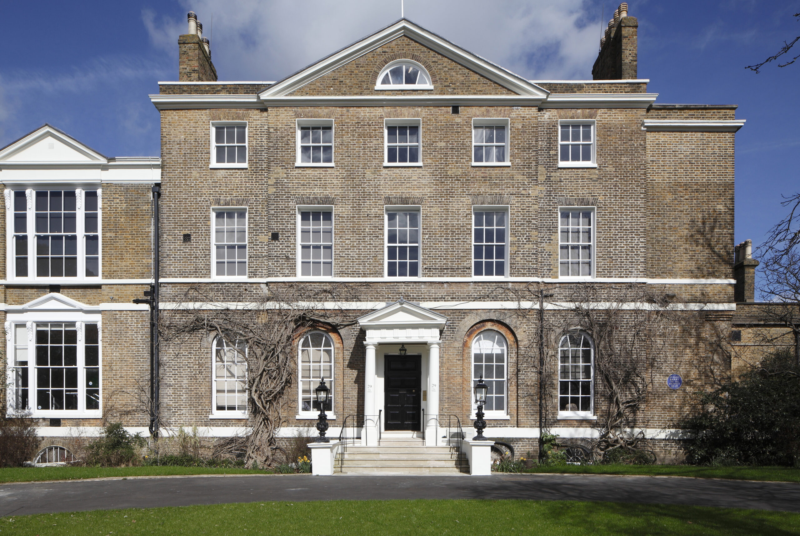 External view of The Elms at Royal Trinity Hospice, a Grade II listed manor by Clapham Common
